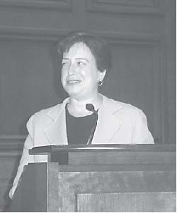 Elena Kagan standing at a podium