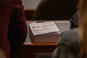 Daron Acemoglu's book Power and Progress on desk