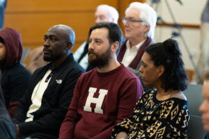 Christopher Hall, Neil Kelly and Adrienne Jones in audience