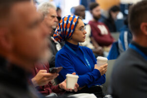 woman sitting in audience