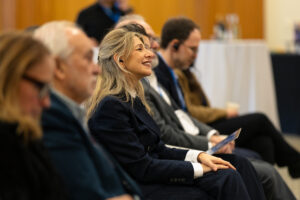 Minister Diaz Perez sitting in audience