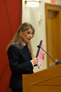 Minister Diaz Perez holding report